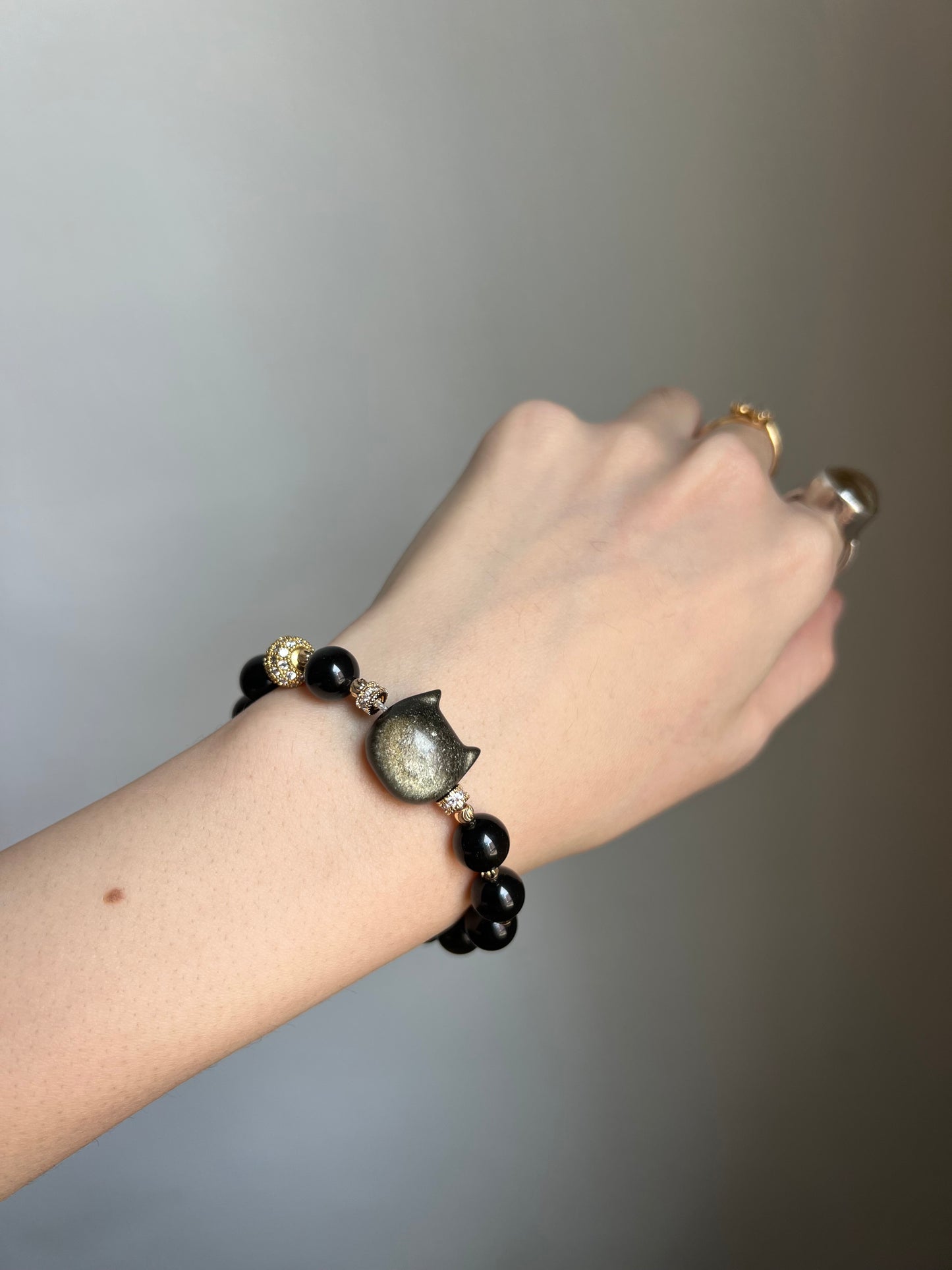 "night zoomies" gold obsidian cat bracelet