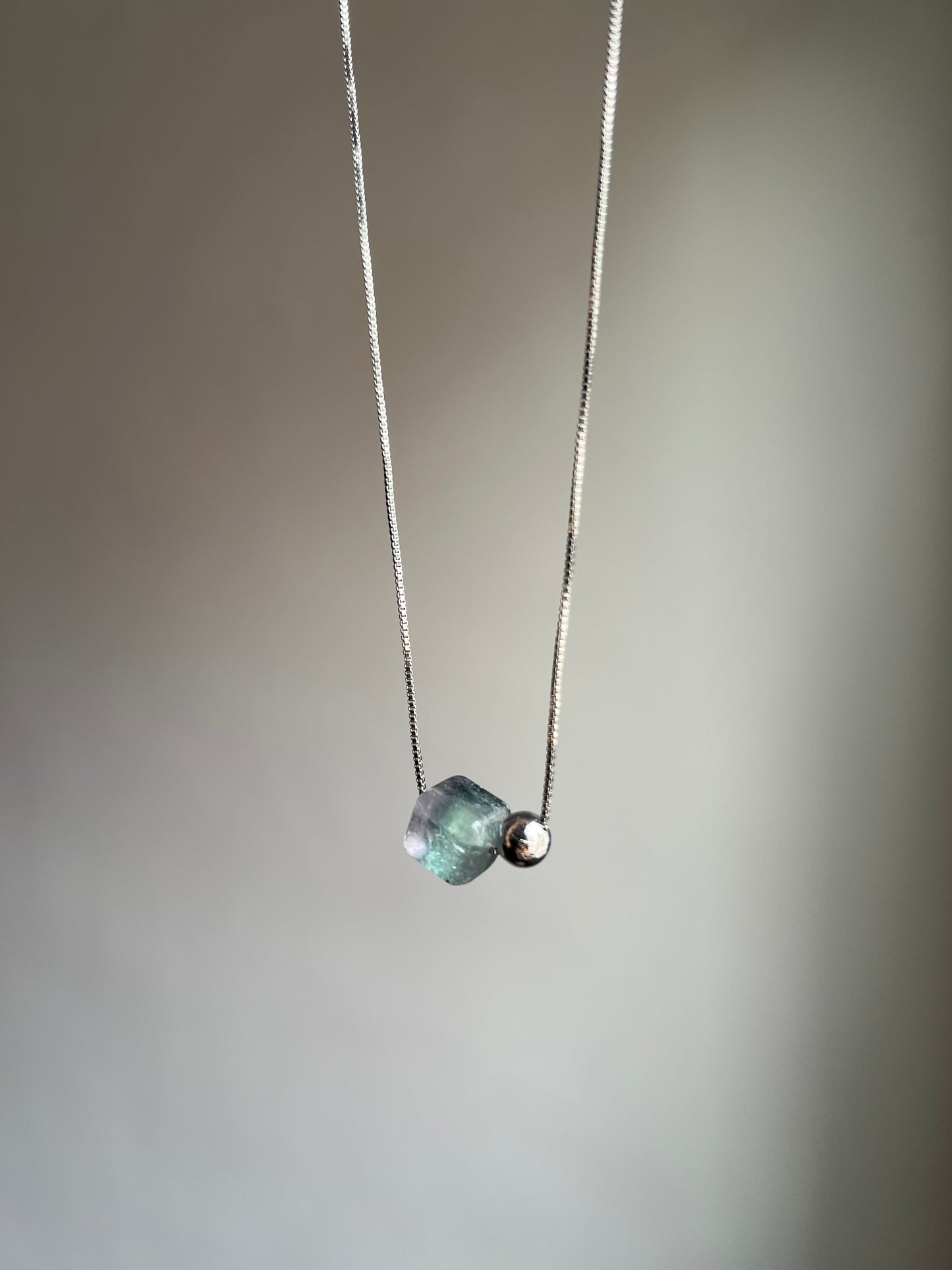 “cosmic order” fluorite + meteorite necklace