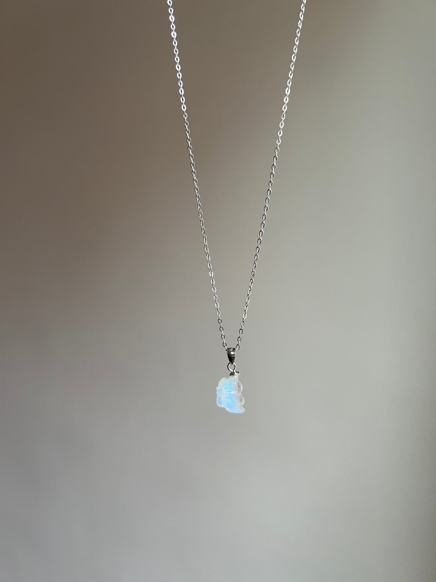 “flutter free” moonstone butterfly necklace