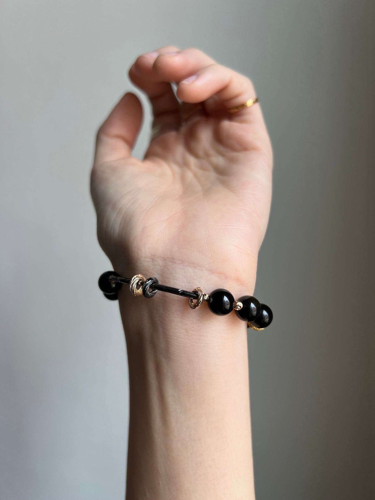 "night zoomies" gold obsidian cat bracelet