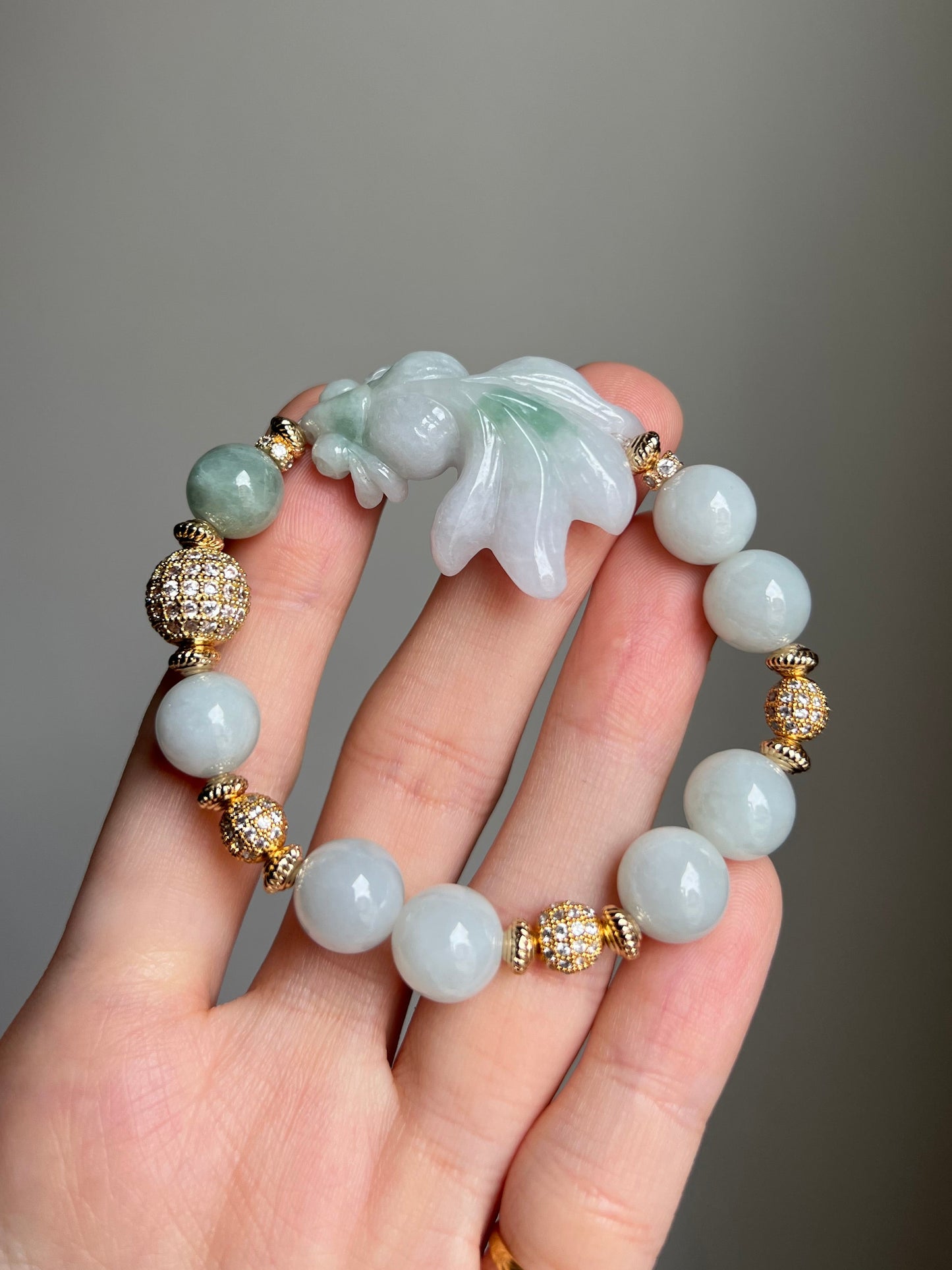 “abundance’s flowing” green x white jadeite goldfish bracelet
