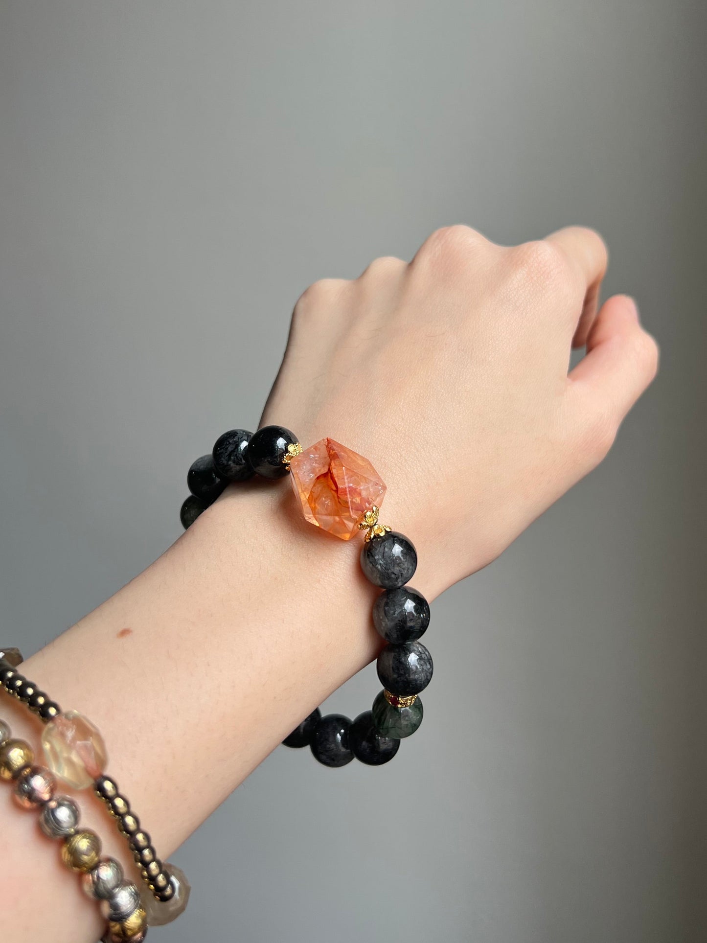 "cardinal's message" fire quartz x black & green rutilated quartz bracelet