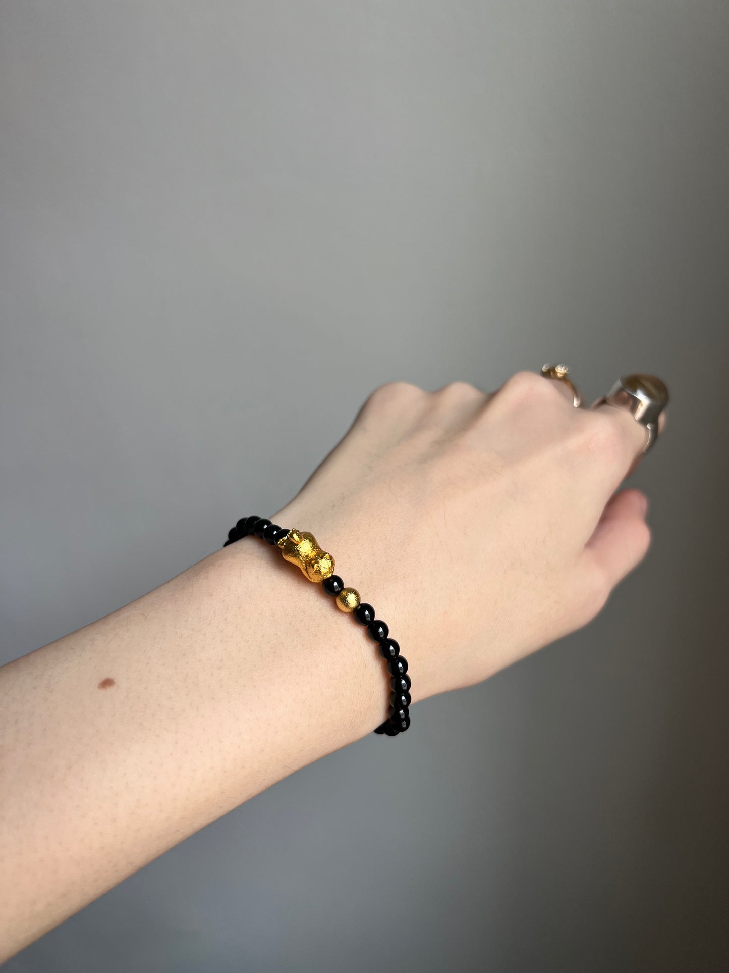 “momo’s golden chase” bracelet