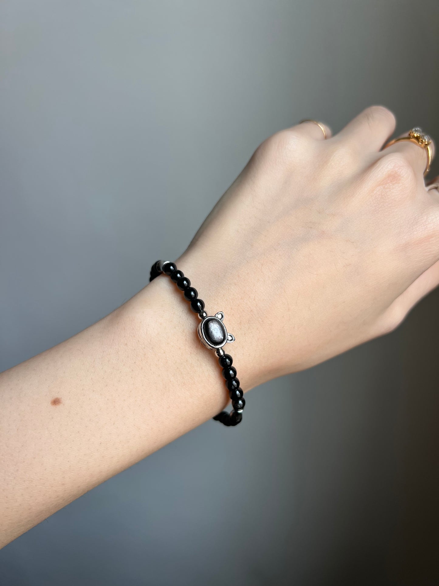 “night vision” hypersthene cat bracelet