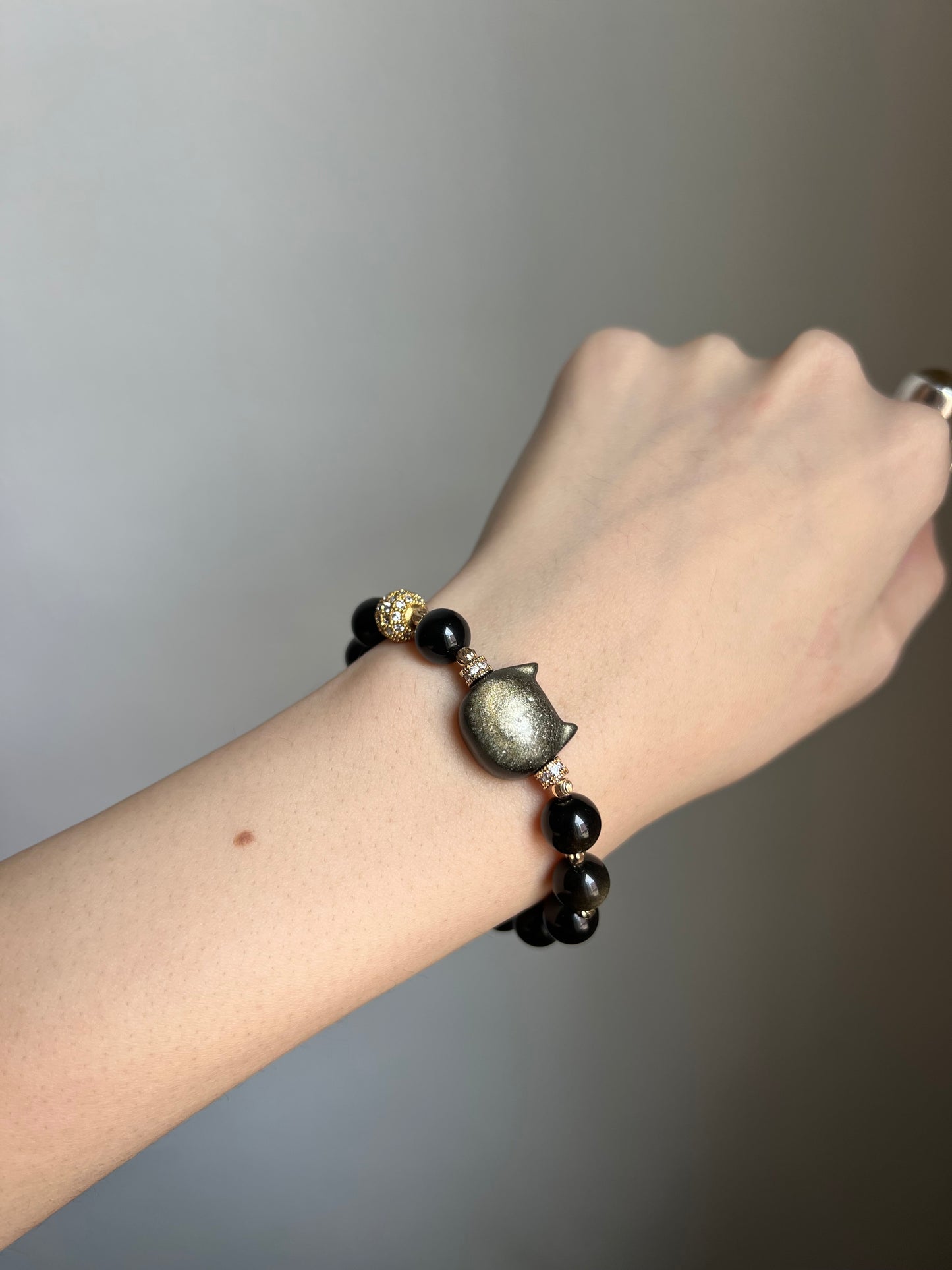 "night zoomies" gold obsidian cat bracelet