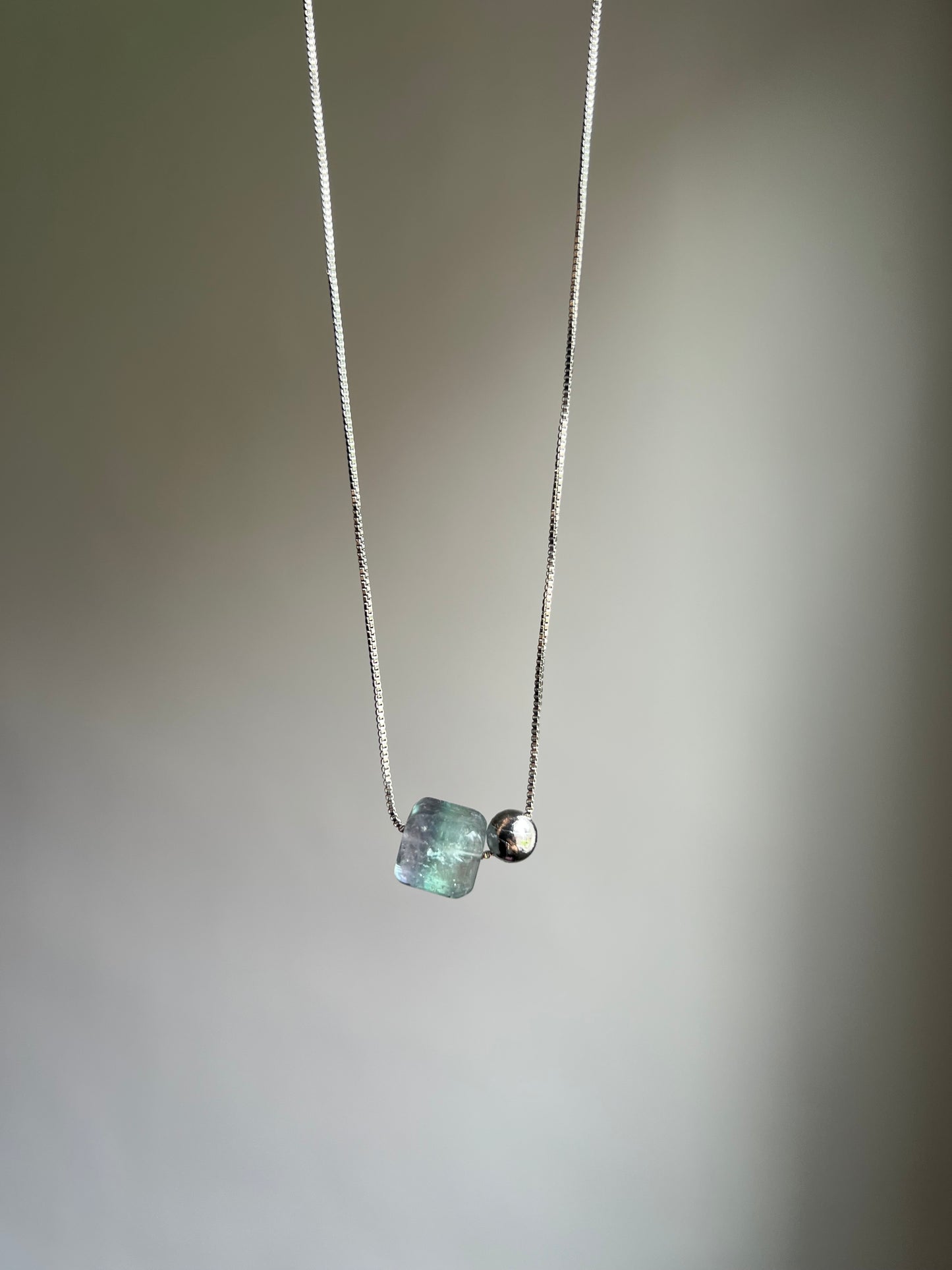 “cosmic order” fluorite + meteorite necklace