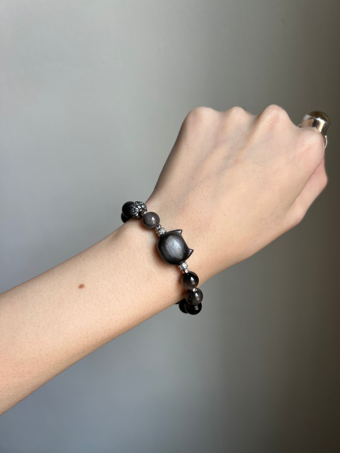 "night zoomies" silver obsidian cat bracelet