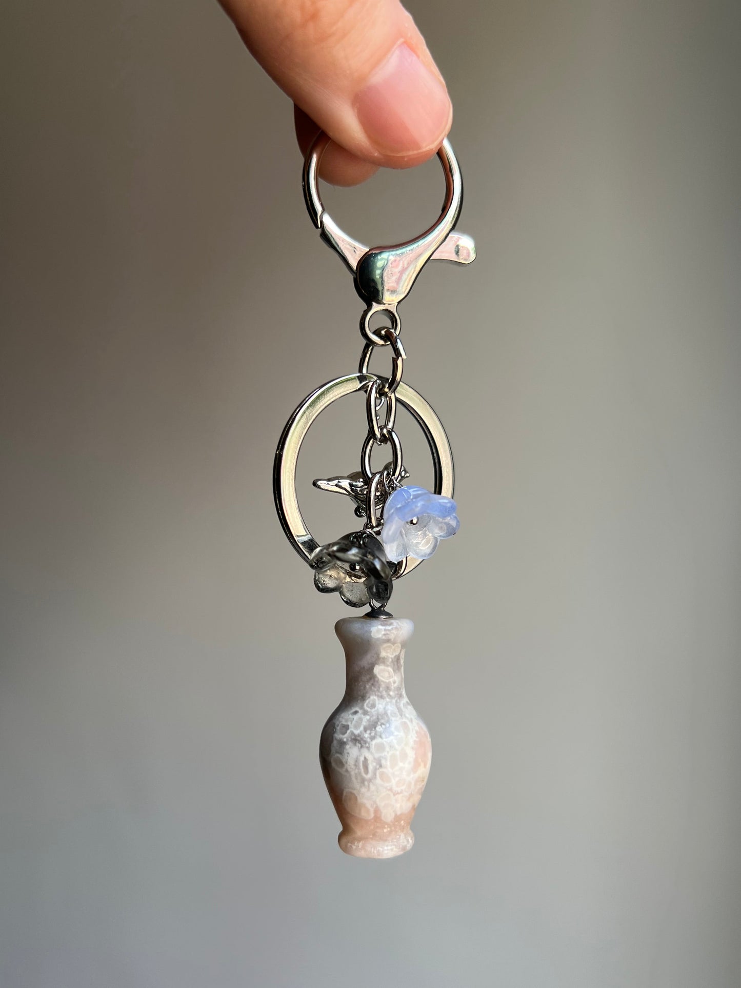 "new beginnings" flower agate vase bag charm