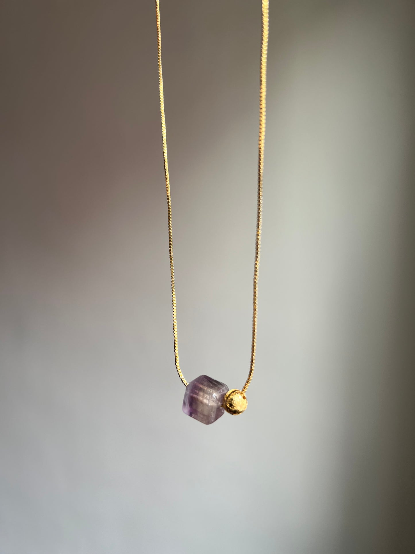 “cosmic order” fluorite + meteorite necklace